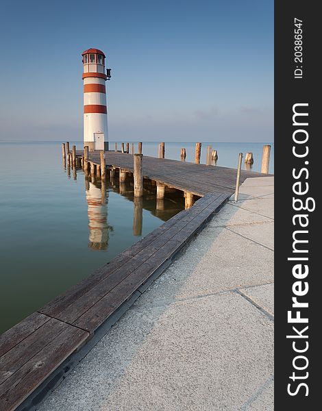 Lighthouse at sunrise in Podersdorf am See which is a small village on lake Neusiedler See, Burgenland, Austria. Lighthouse at sunrise in Podersdorf am See which is a small village on lake Neusiedler See, Burgenland, Austria