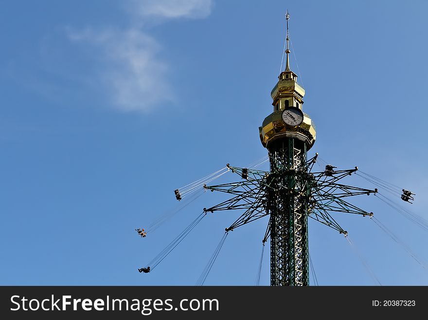 A carousel high up in the sky on a fair in Vienna