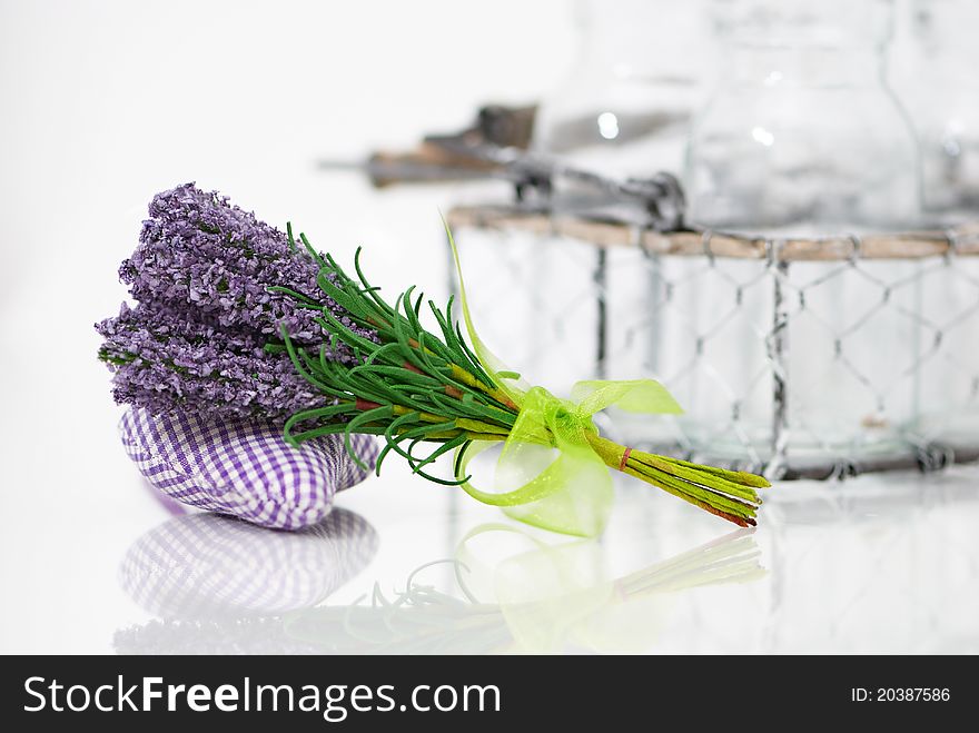 Bunch of lavender flower on an aromatic pillow with a reflection