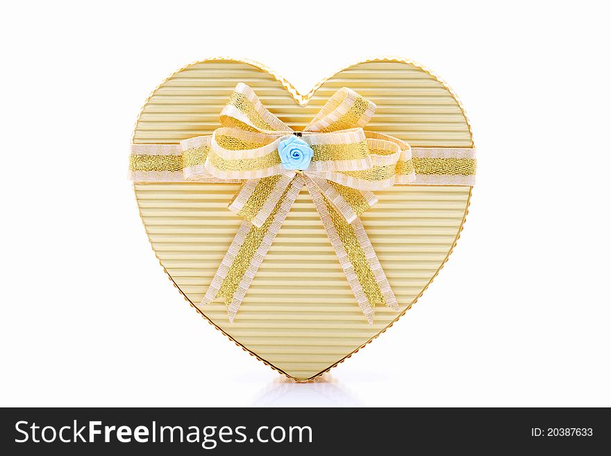 Heart shaped box with bow isolated on white background. Heart shaped box with bow isolated on white background