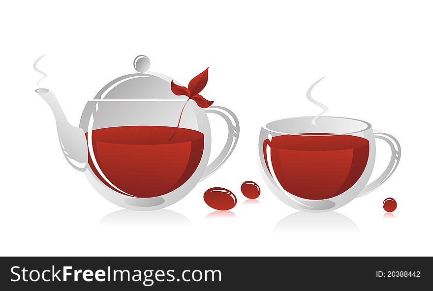 Glass teapot and a mug with strong tea, a tea leaf and sweets