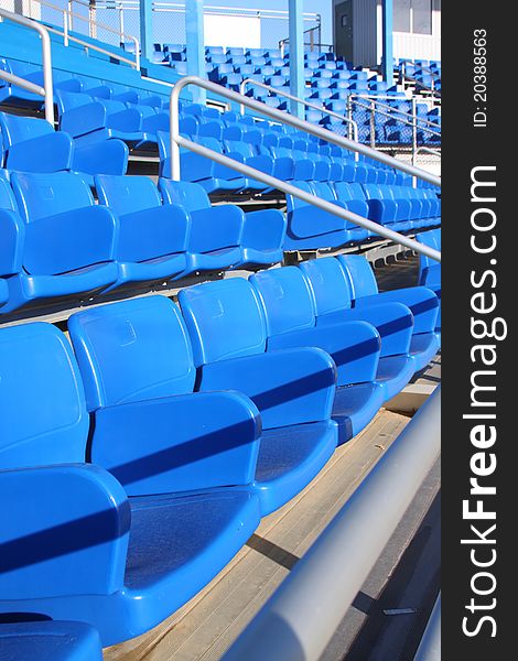 Blue seats of a stadium's stand. Blue seats of a stadium's stand