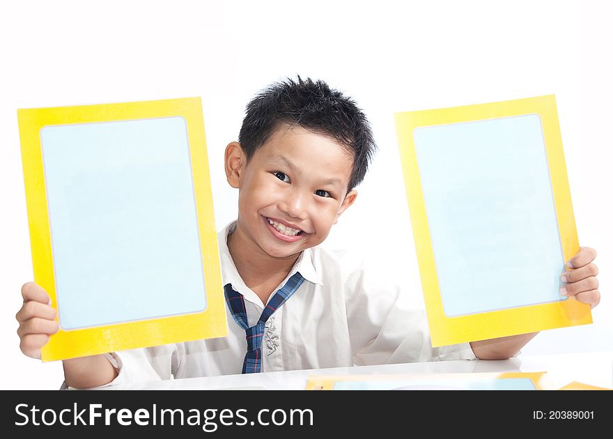 A Boy Holding Empty Cards On White Table