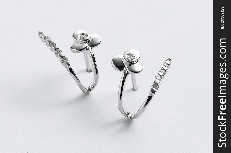 Unique design of a pair of white-gold earrings