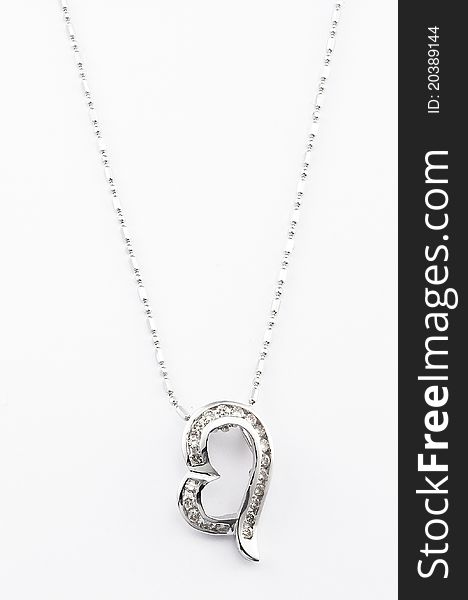 A necklace with a contemporary heart-shape like pendant. A necklace with a contemporary heart-shape like pendant