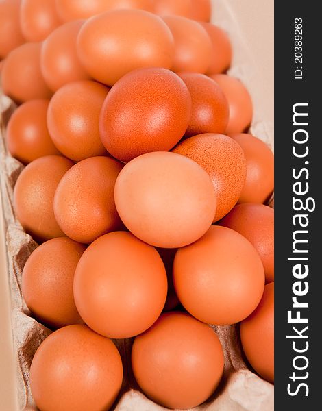 Close up of eggs in cardboard container