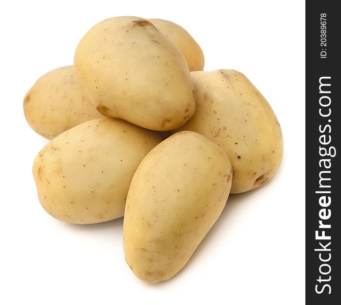 Washed potatoes over white background.
