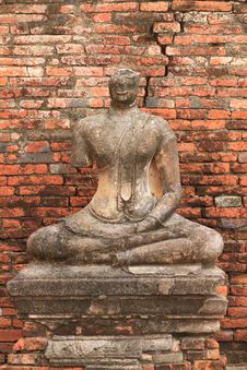 Ruined Statue Of Buddha, Ayuthaya, Thailand. Royalty Free Stock Images