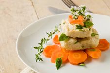 Cod On Carrot Bed With Fresh Oregano And Basil Stock Image Cod On Carrot Bed With Fresh Oregano And Basil Stock Image