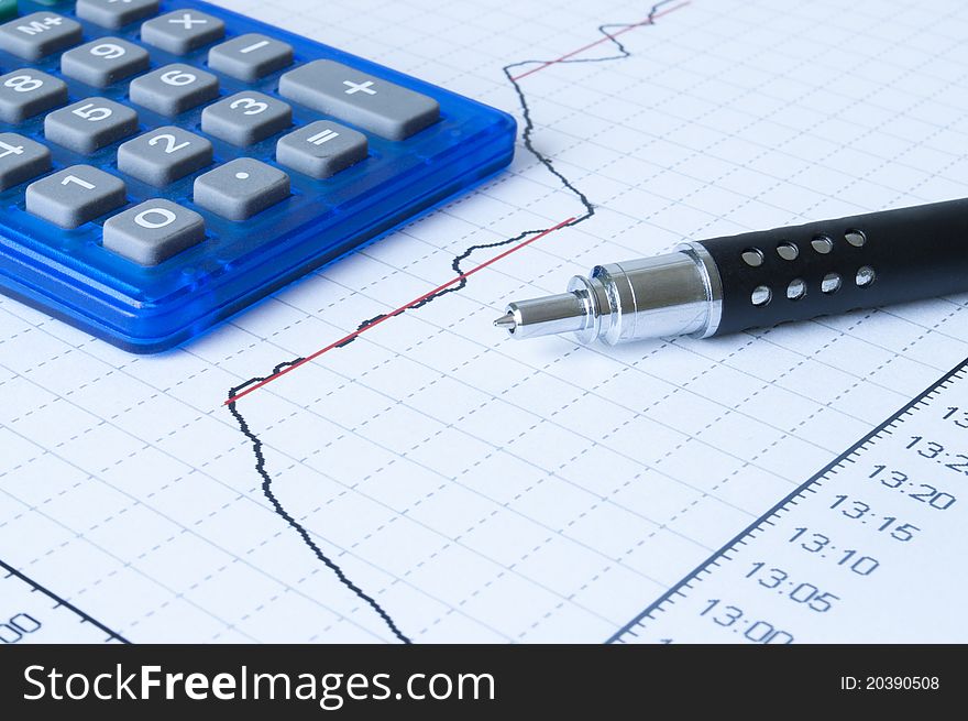 Pen drawing graph and notebook