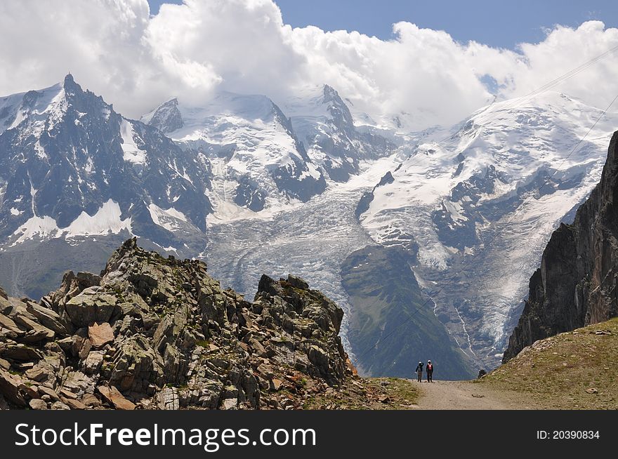 The expedition in the mountains overlooking the Mont Blanc. The expedition in the mountains overlooking the Mont Blanc