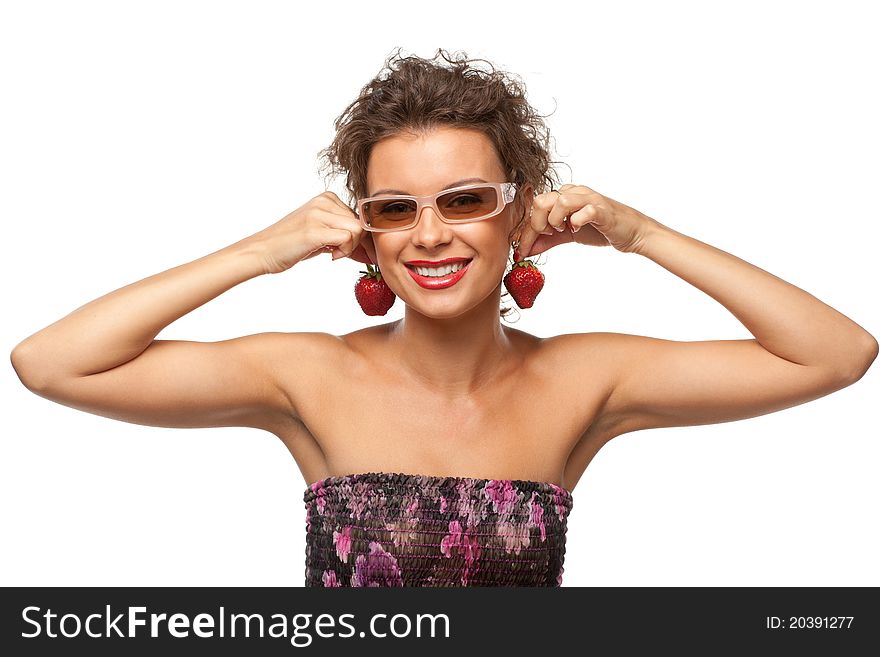 Closeup portrait of young female holding strawberry like earrings, isolated on white background. Closeup portrait of young female holding strawberry like earrings, isolated on white background