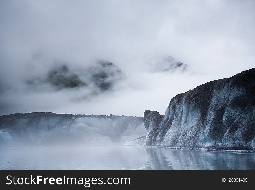 Glacier iceberg in the mist in Alaska