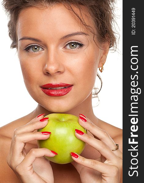 Close-up portrait of young female holding green apple, isolated on white background. Close-up portrait of young female holding green apple, isolated on white background