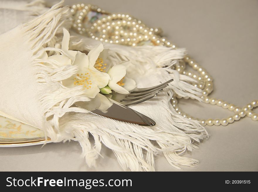 Festive white jasmine table setting