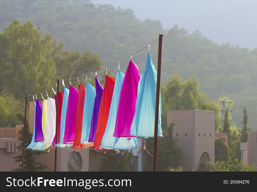 Multicolored Chinese lanterns on a rope outdoors