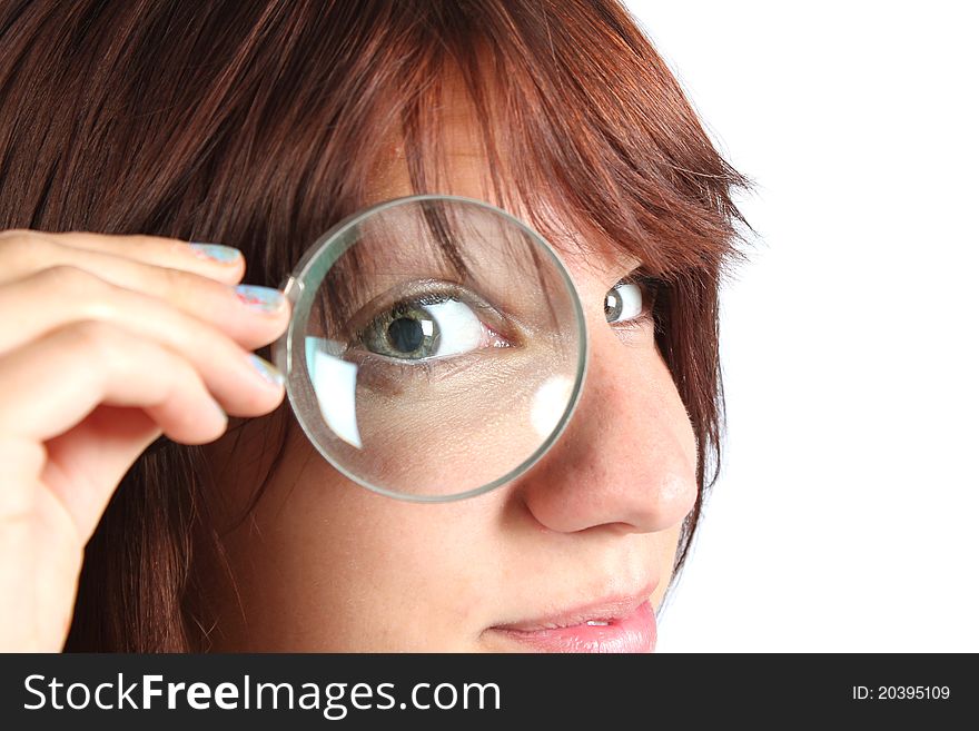 Girl searching for something with a magnifier. Girl searching for something with a magnifier