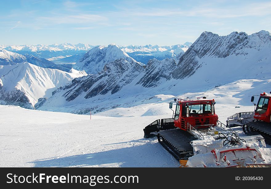 Snowcats Parked On Top Of Mountain