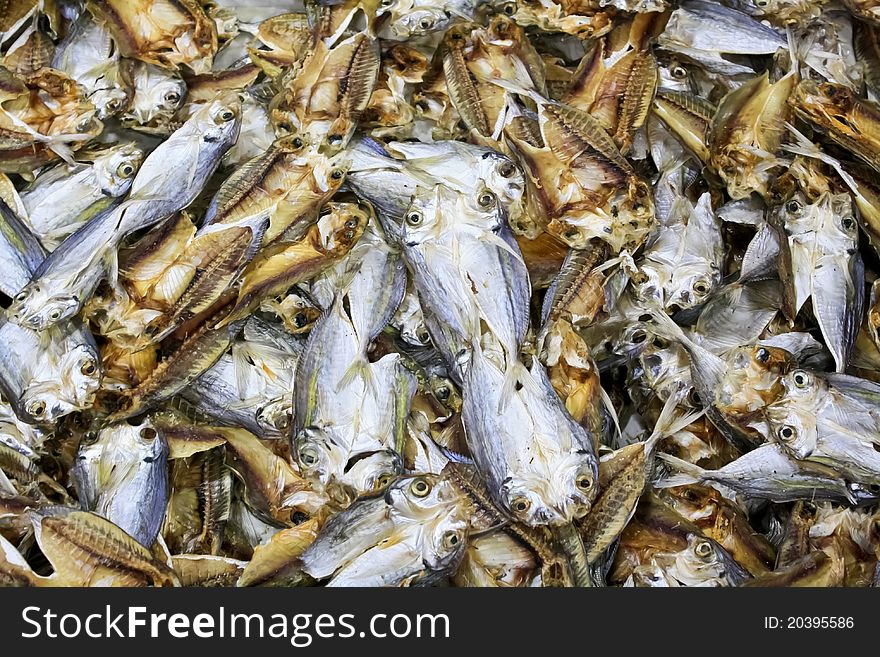 Dried fish cut in half at the market. Dried fish cut in half at the market