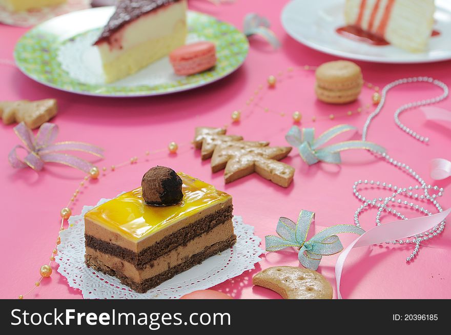 Colorful dessert party with many cakes.