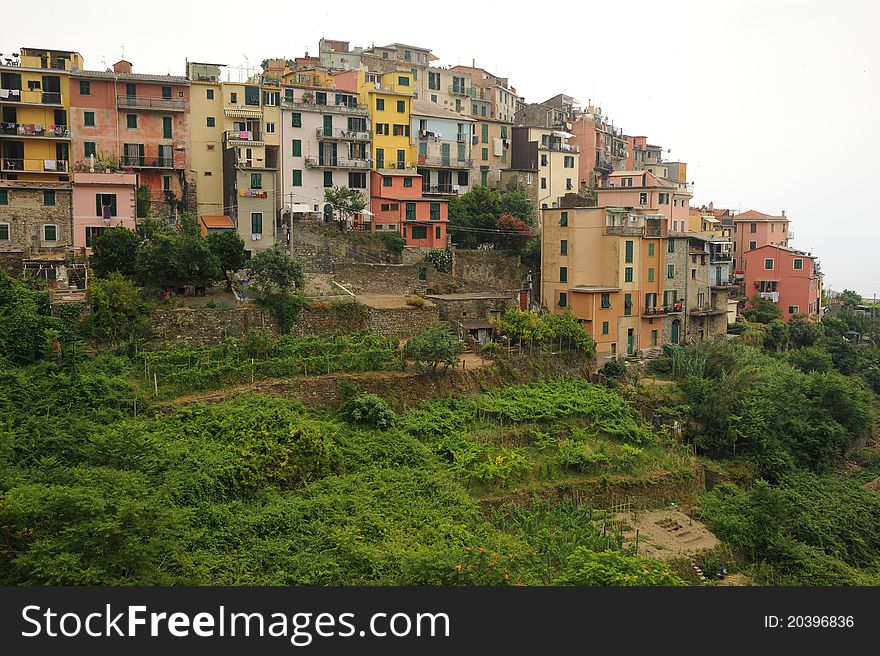 Colourful Corniglia, perched atop a cliff overlooking the Mediterranean. Corniglia is one of the stunningly beautiful Italian Cinque Terre villages and a UNESCO world heritage site. Colourful Corniglia, perched atop a cliff overlooking the Mediterranean. Corniglia is one of the stunningly beautiful Italian Cinque Terre villages and a UNESCO world heritage site.