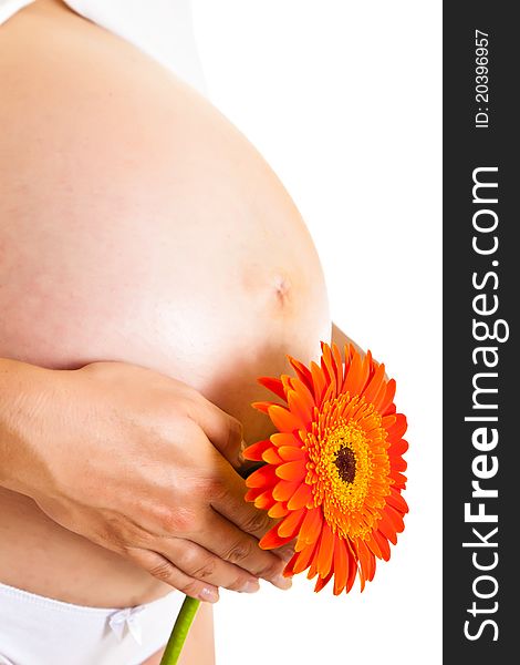 Pregnant woman with flower