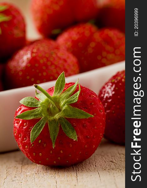 Strawberries on wooden table