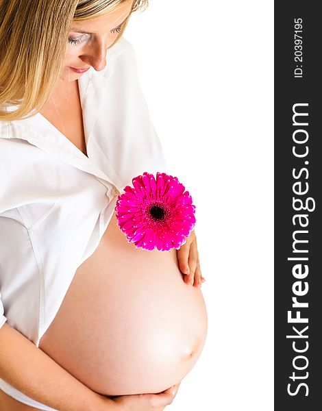 Pregnant woman holding gerbera flower isolated on white. Pregnant woman holding gerbera flower isolated on white