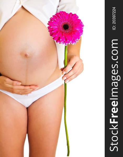 Pregnant woman with flower