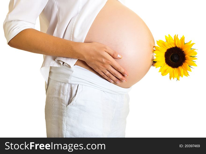 Pregnant woman holding sunflower