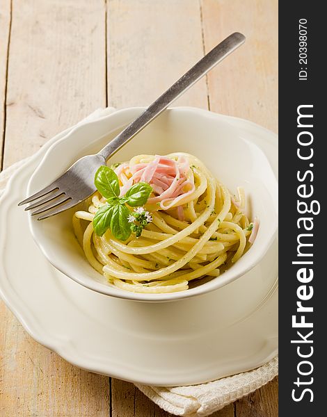 Photo of delicious pasta with sour cream and ham