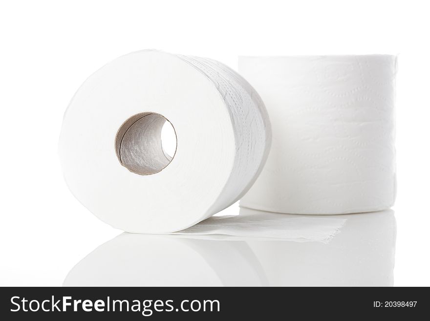 Clean white toilet paper against a white background