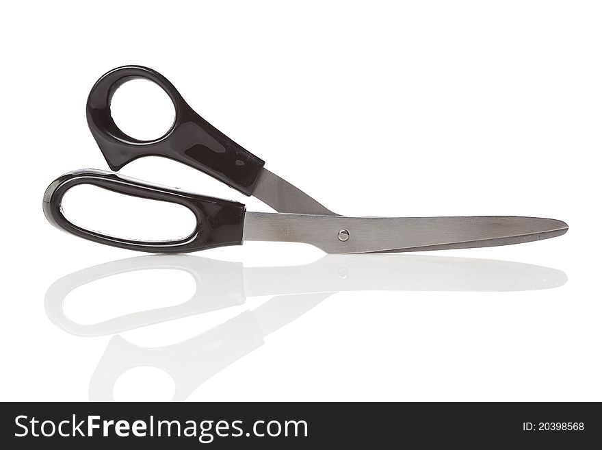 A pair of black scissors against a white background