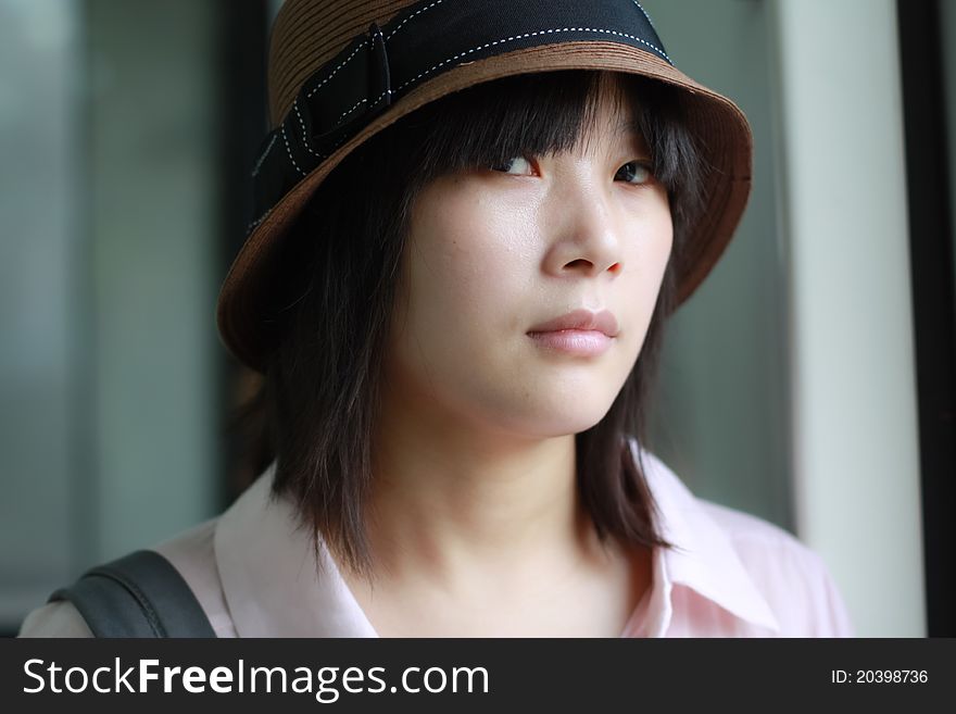 Closeup of lovely girl with hat
