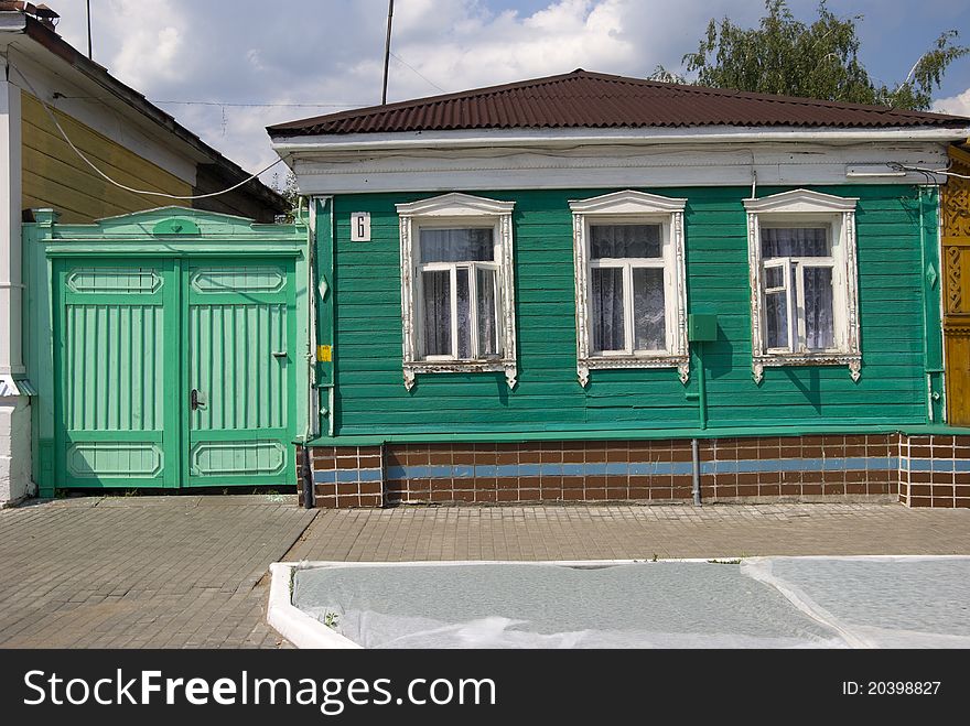 Restored wooden house and fence in the town of Kolomna. Restored wooden house and fence in the town of Kolomna.
