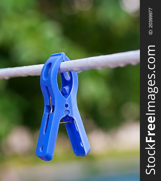 Blue Clothespin On The Line
