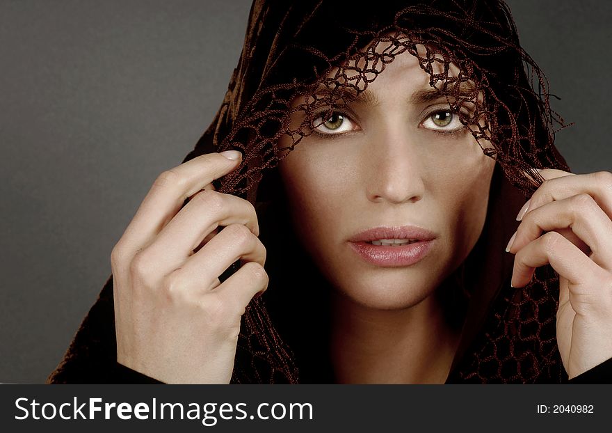 Beautiful portrait of a middle eastern woman with shawl. Beautiful portrait of a middle eastern woman with shawl