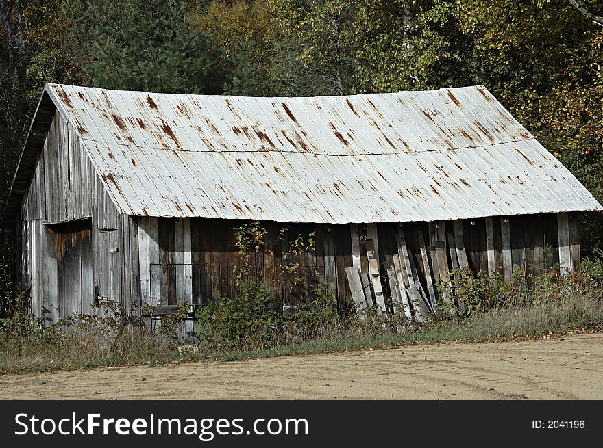 Old wooden rusty barn, Quebec, Canada. Old wooden rusty barn, Quebec, Canada