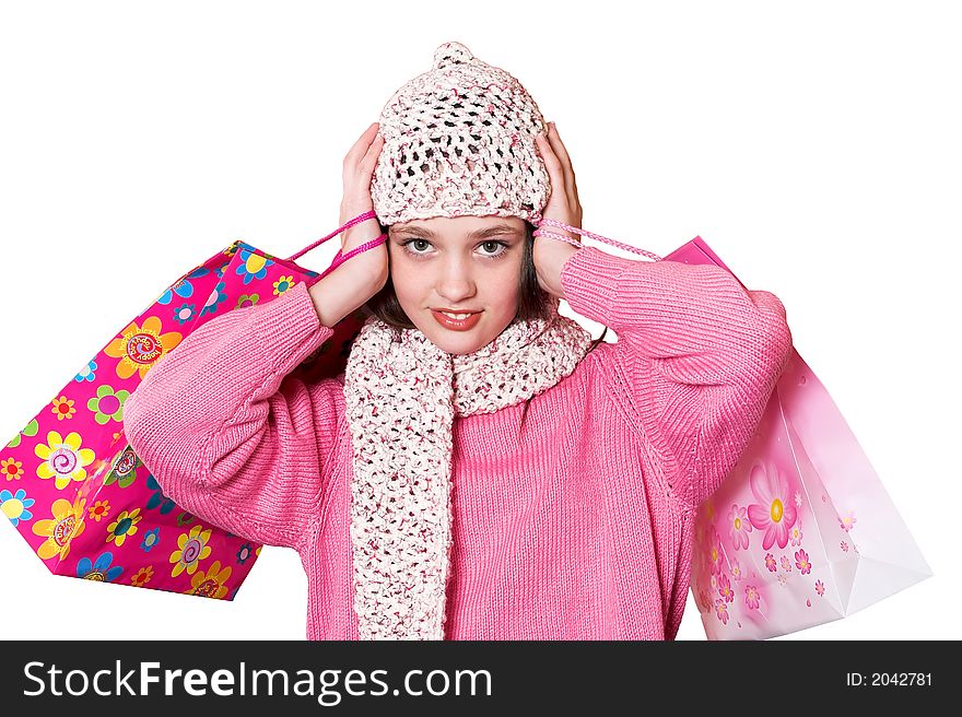 Pretty girl with shopping bags on white background