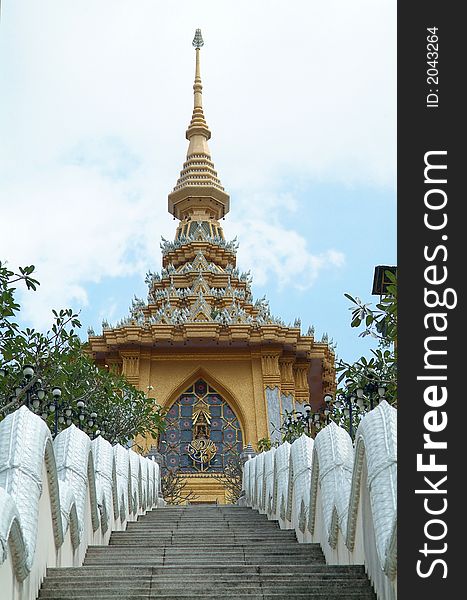 The steep stairs leading to a Buddhist shrine on the top of a hill at Wad Yan near Pattaya, Chonburi province, Thailand. The steep stairs leading to a Buddhist shrine on the top of a hill at Wad Yan near Pattaya, Chonburi province, Thailand