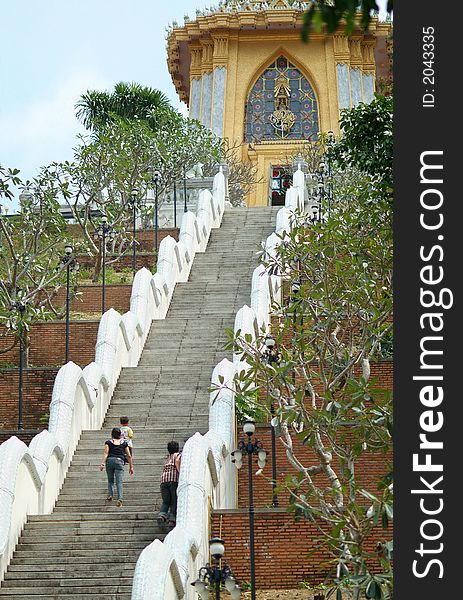 The steep stairs leading to a Buddhist shrine on the top of a hill at Wad Yan near Pattaya, Chonburi province, Thailand. The steep stairs leading to a Buddhist shrine on the top of a hill at Wad Yan near Pattaya, Chonburi province, Thailand