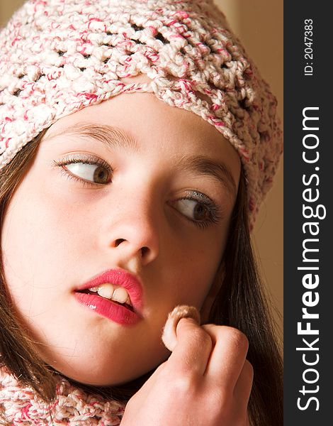 Pretty girl cleaning face with cotton