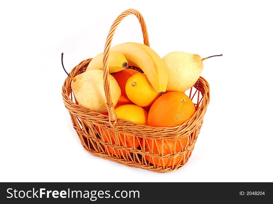 Fruits in basket on white background