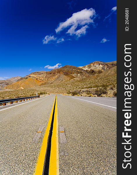 Shot of a desolate roadway in the desert of Death Valley, California. Shot of a desolate roadway in the desert of Death Valley, California.