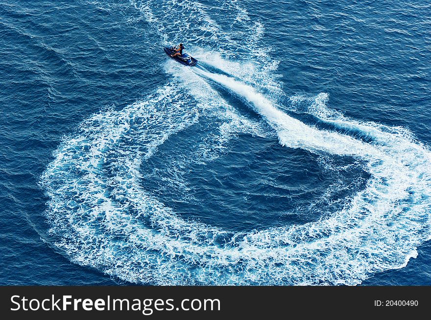 Water motorcycle in the sea and its trace