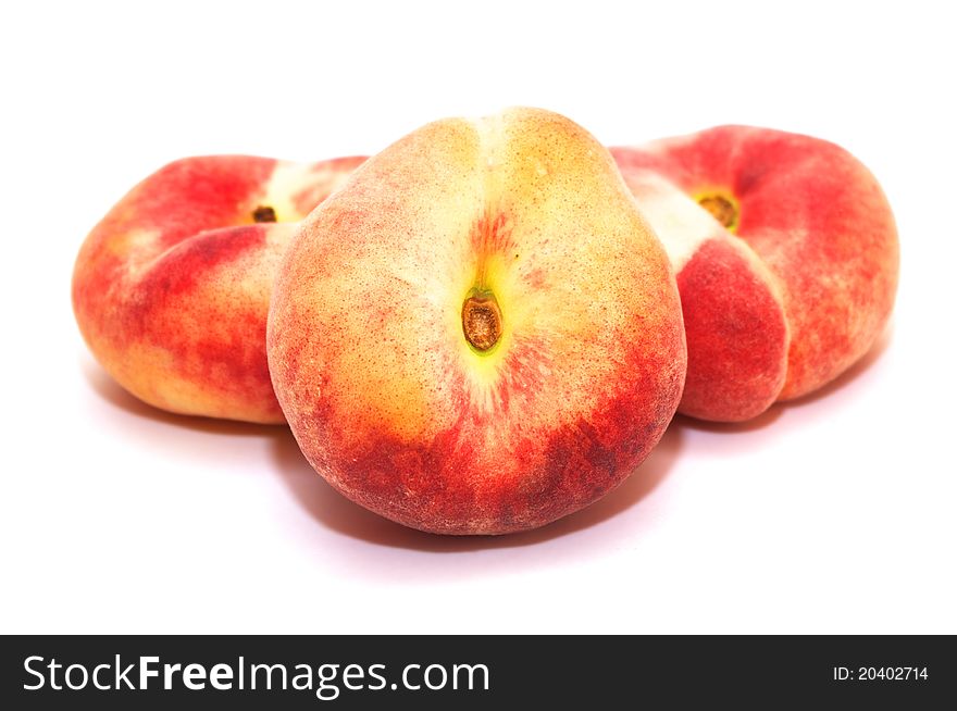 Photo of the Peaches on white background