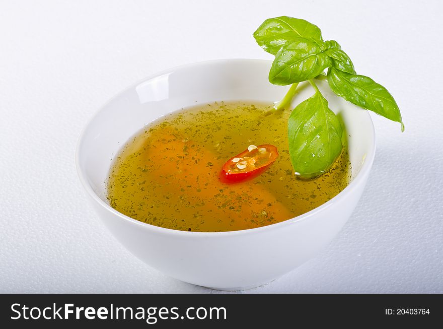 A fresh summery broth with leek onion, and carrot