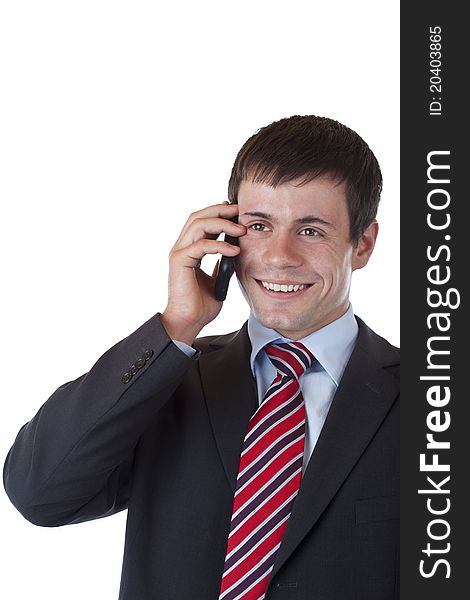 Banker listens to good news on mobile phone