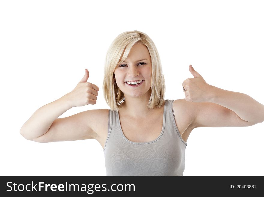 Beautiful blond woman holds both thumbs up and smiles.Isolated on white background.