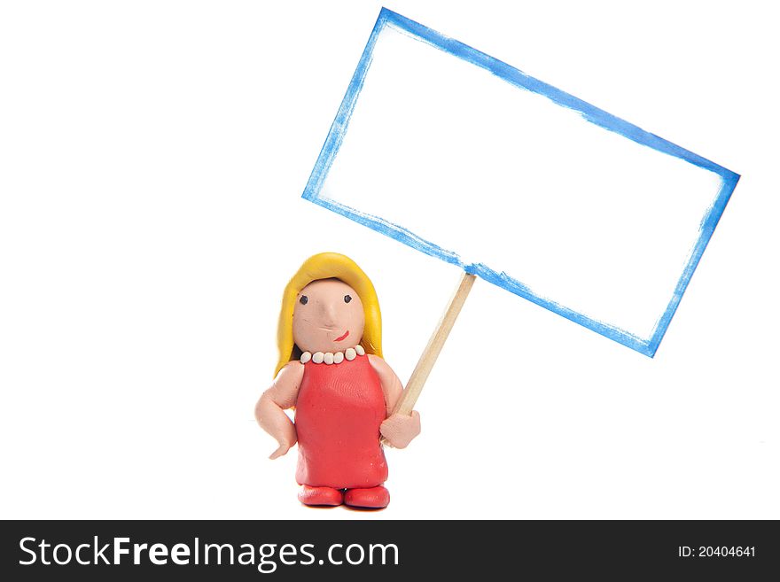 Small blond lady made of modelling clay wearing a red dress holding a blank sign. Small blond lady made of modelling clay wearing a red dress holding a blank sign.